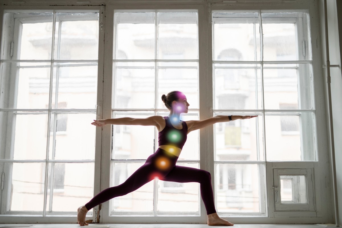 young-woman-meditating-with-chakras-her-body (1)